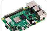 Photo of a Raspberry Pi board attached to the prompt